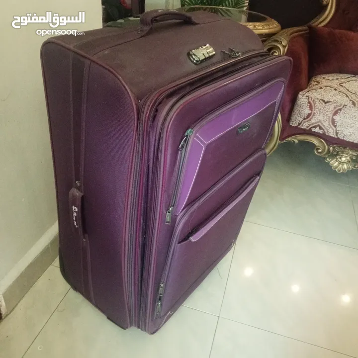 شنتة سفر جر لون بنفسجي غامق حجم كبير