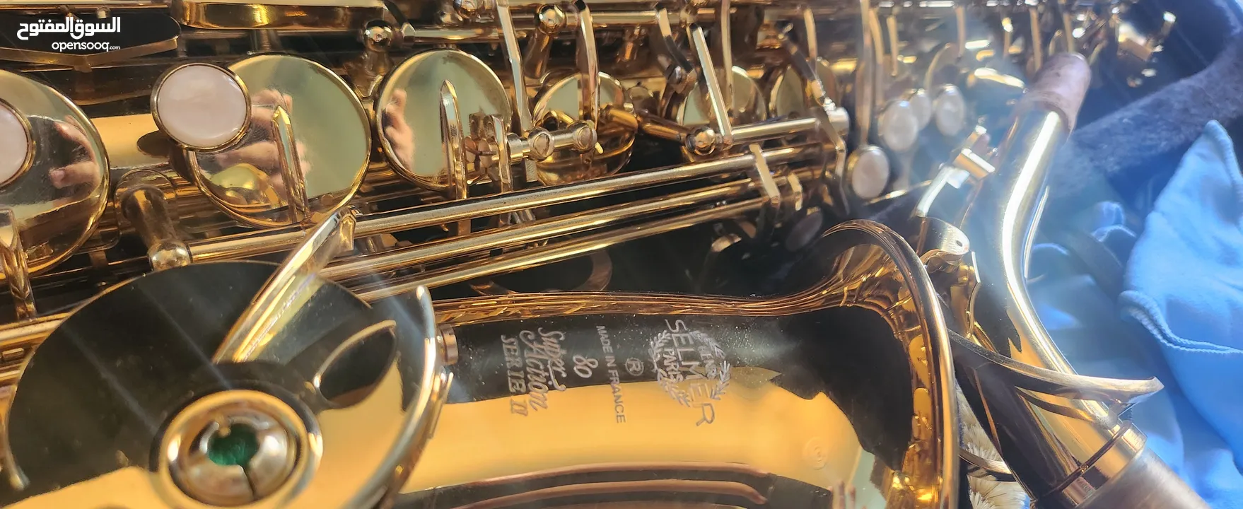 ساكسوفون طقريبا جديد بحالة ممتازه مع ستاند و ستراب  Alto Saxophone like new in excellent condition