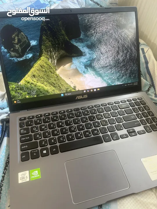 ASUS business laptop I5 1.25TB Storage MX 130 and intregrated graphics.