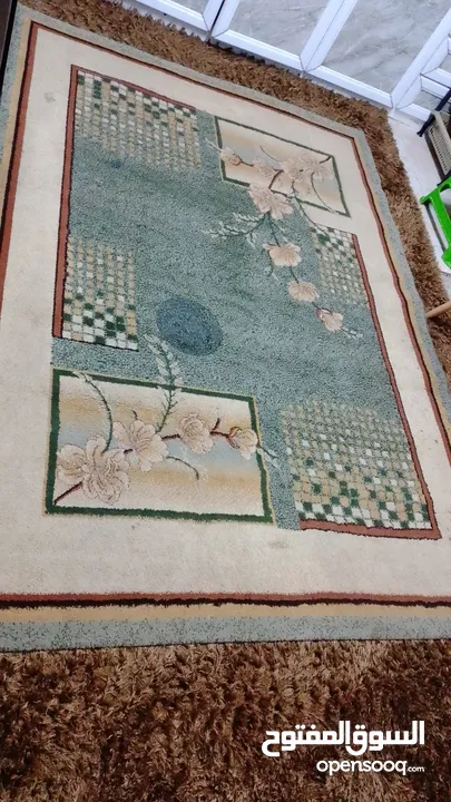سجاده مستعمله طولها مترين و30 والعرض متر و70