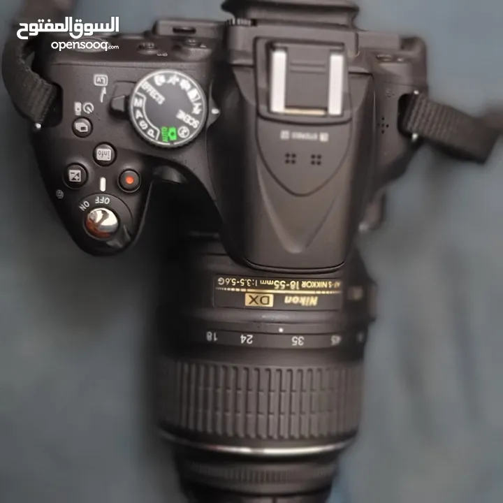 كاميرا نيكون D5200 مع عدستين(18-55)mm  و (55-200)mm