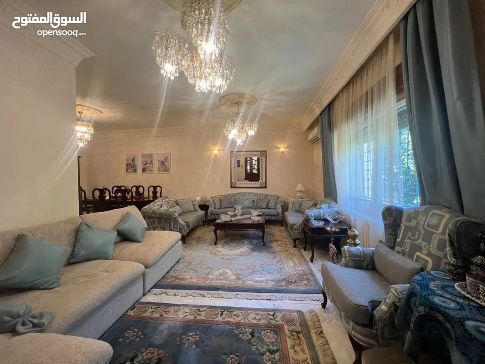 شقة أرضية مميزة مع حديقة وكراج مستقل للبيع بداعي السفر