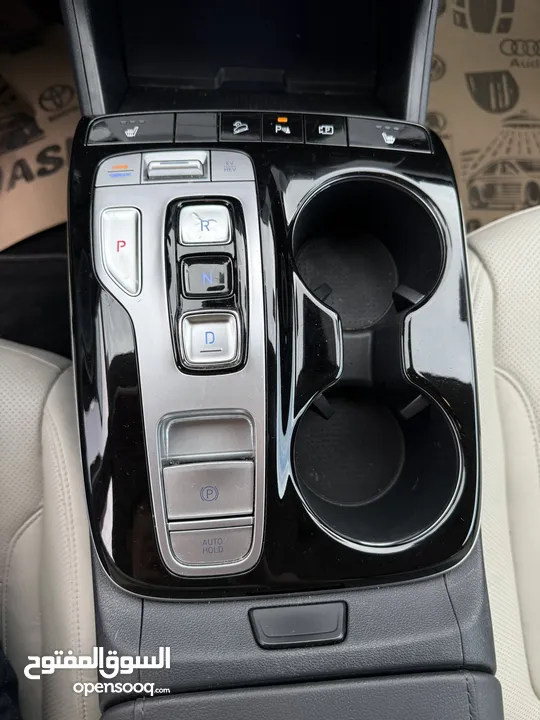 هونداي توسان ترخيص 2022 محرك 1600 هايبرد plug in/يقطع على الشحنه 65 كيلو متر جير أوتوماتيك
