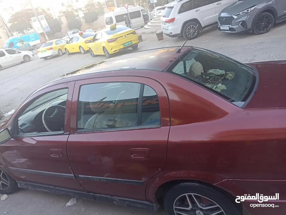 أوبل أسترا السياره مرتبه قبل ما تشتري افحص وين ما بدك السيارة متواضعة