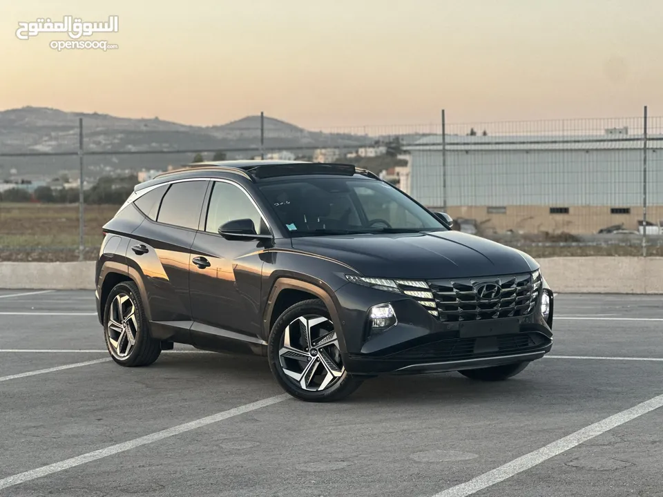 هونداي توسان/2022 Plug In فل الفل فتحة سقف بانوراما  4x4 ///271Hp   ( Haybrid) 1600cc