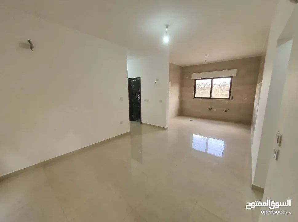عماره جديده/4 شقق طابقيه للبيع
