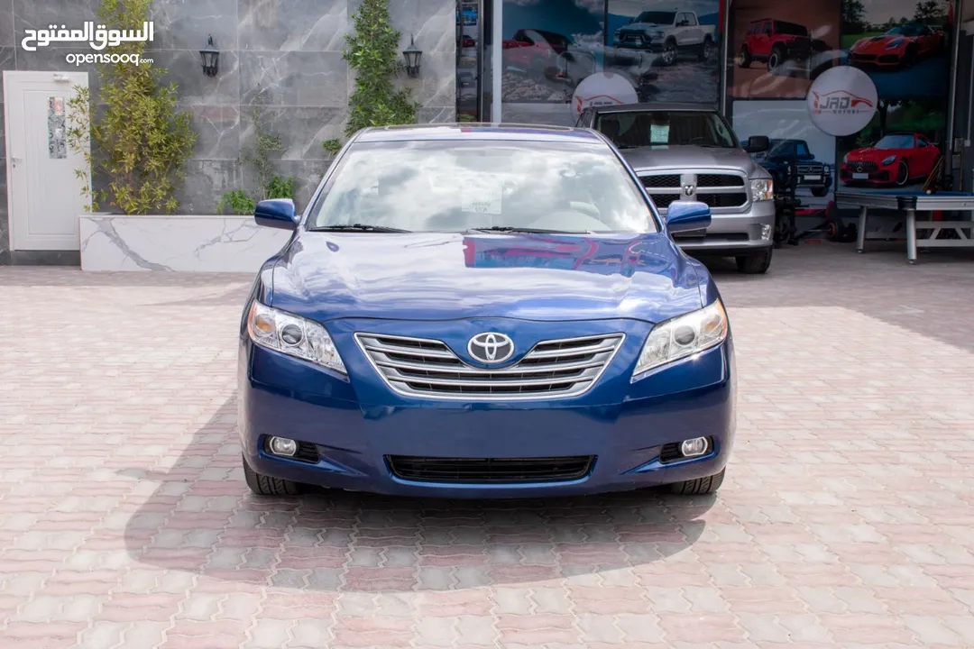 Toyota camry 2007 with sunroof تويوتا كامري فل مع فتحة سقف بحالة الوكالة