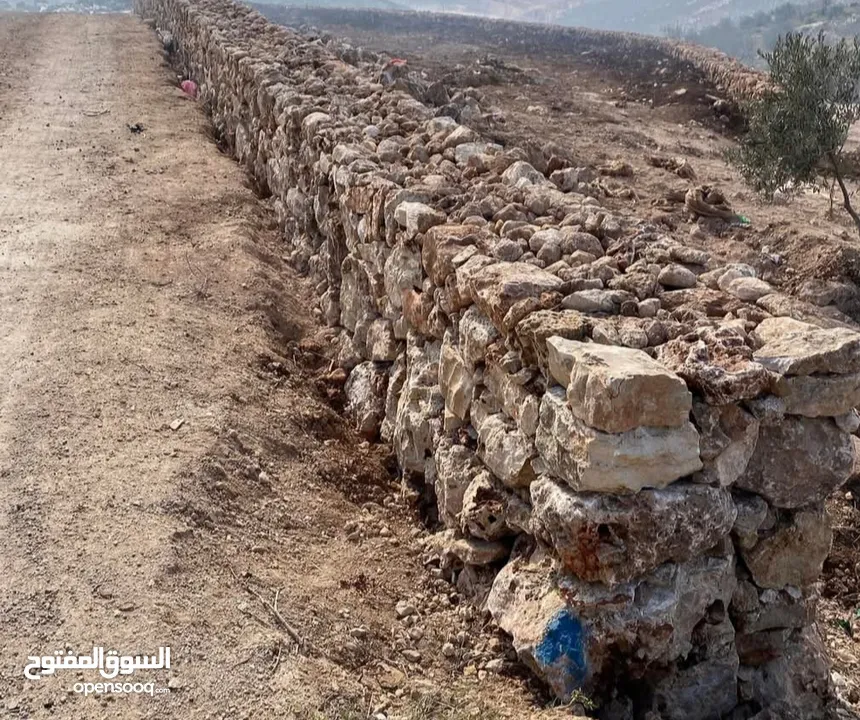مقاولات بناء جدران حجر طلياني تبليط ساحات حجر  تعمير اراضي وتشييك وبناء جدران سلاسل حجرية