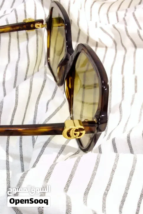 نظارات شمسية Gucci havana اصلية 100% شبه جديدة مع الرقم التسلسلي موجود فيها