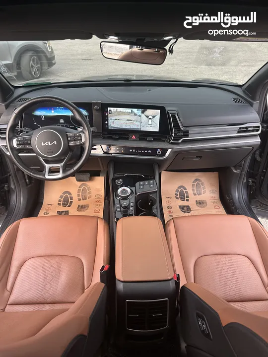 سبورتاج هايبرد 2023 - فل مسكر مع بانوراما - عداد قليل - غرفه مميزه جداً - سعر مميز جداً ع الكاش