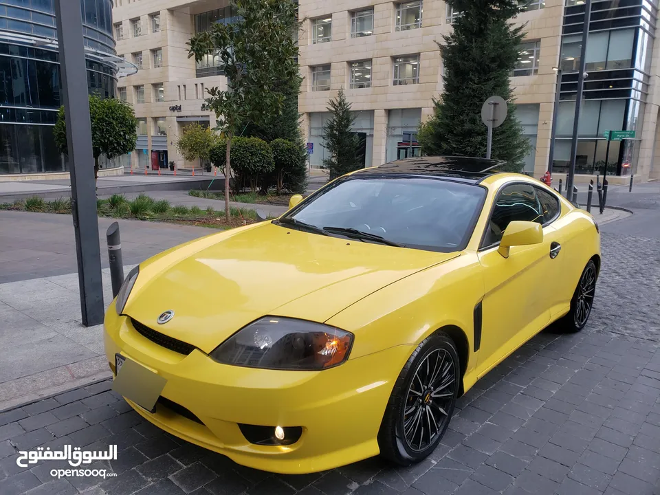 هونداي توسكاني شكل 2005 كامله الاضافات