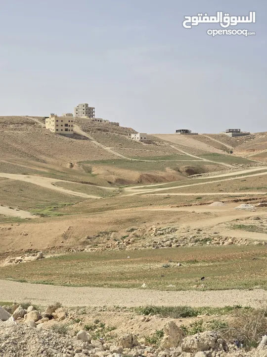 أرض على شارع المية ممر عمان التنموي للبيع