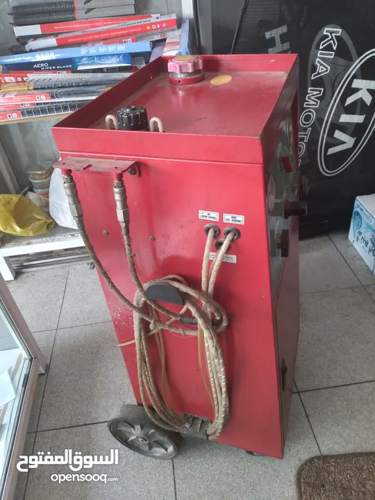 جهاز فحص سيارات  كومبيوتر وجهاز تنظيف بخاخات