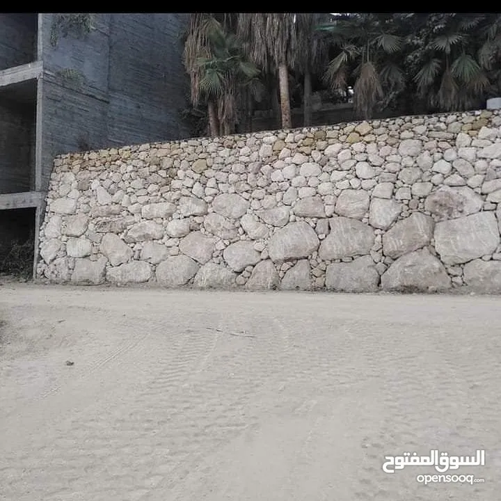 استصلاح اراضي بناء سناسل بناء سلاسل تشييك مزارع تشييك اراضي توريد تراب احمر والأشجار المثمرة والزينه