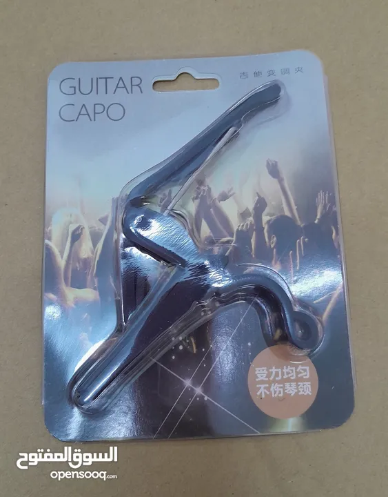 new guitar capo, new guitar strap,delivery WhatsApp