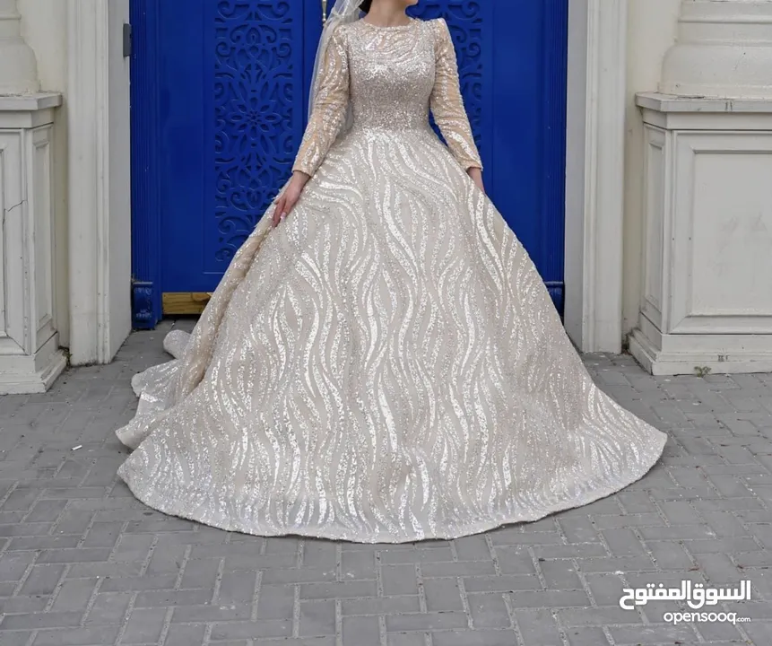 بدلة عرس لبسة وحدة محجبة