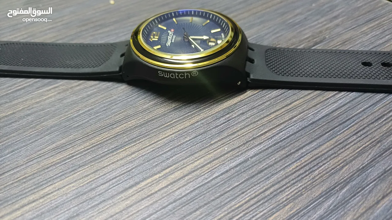 "ساعة سويس اصلي Swatch Swiss Royal Blue Gold: أناقة سويسرية بتصميم عصري وفاخر"