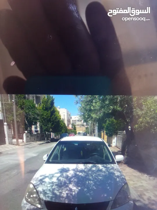 ميتسوبيشي لانسر للبيع بحاله ممتازه