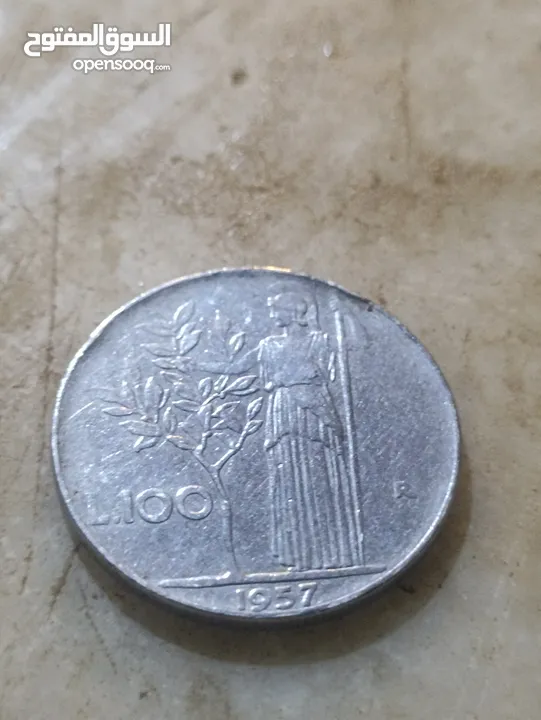 قطعة نقدية إيطالية من فئة 100 ليرة، وتُظهر تاريخ 1957.