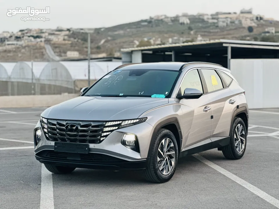 هونداي توسان 2022 فل بدون فتحة سقف  2x4 ///240Hp بنزين + كهرباء  ( Haybrid) 1600cc