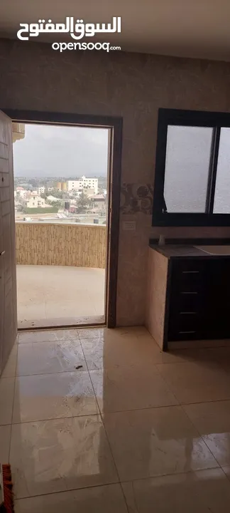 شقة جديدة للايجار شارع المدارس