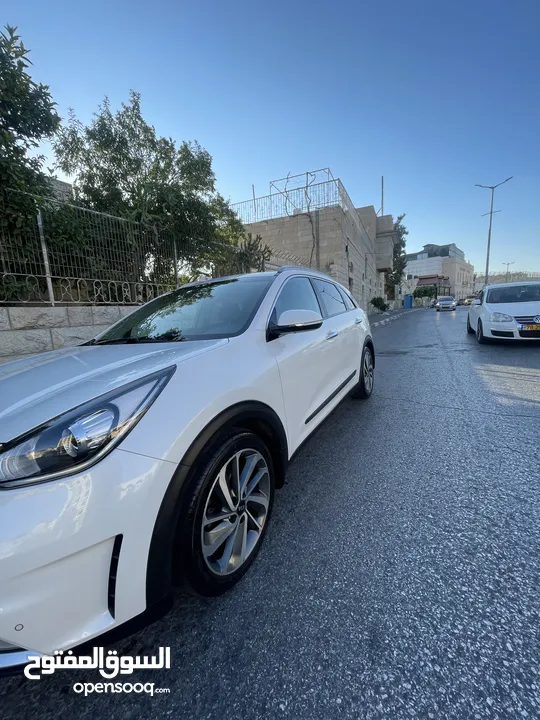 كيا نيرو 2019 -الاتصال على رقم الوطنيه في الوصف