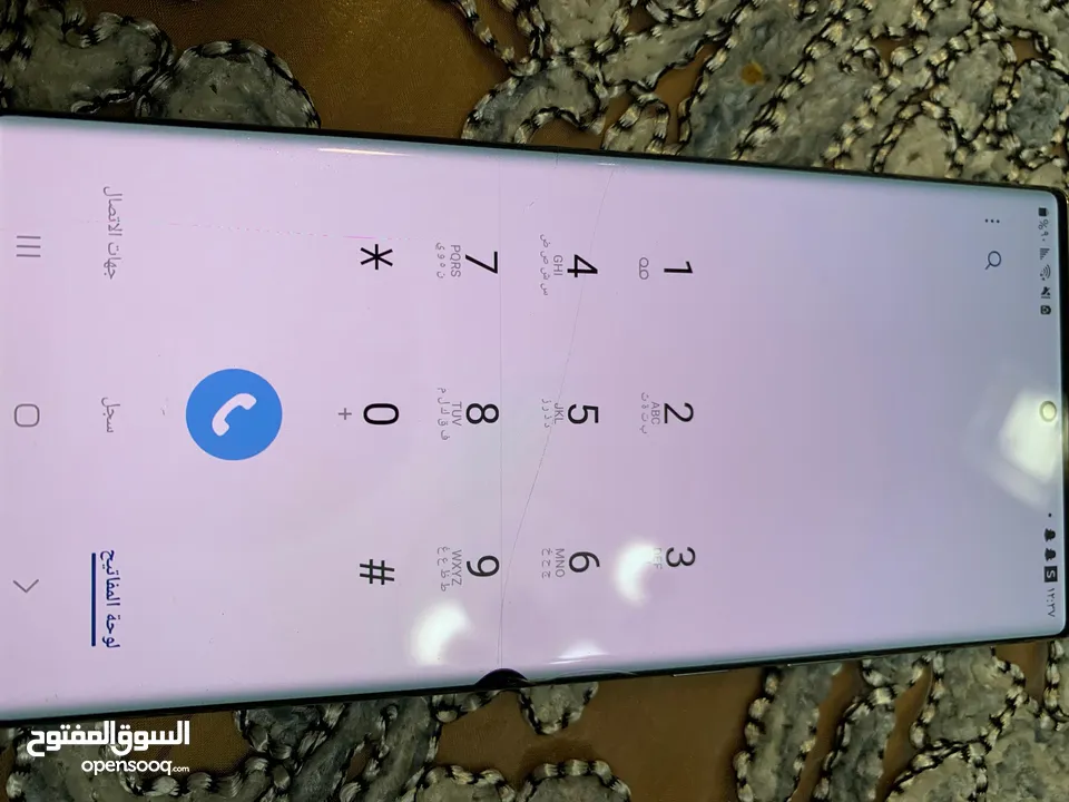 تلفون نوت 20الترا فيه شرخ ونقطه وخلفية وكاله نضيف ولا شرخ