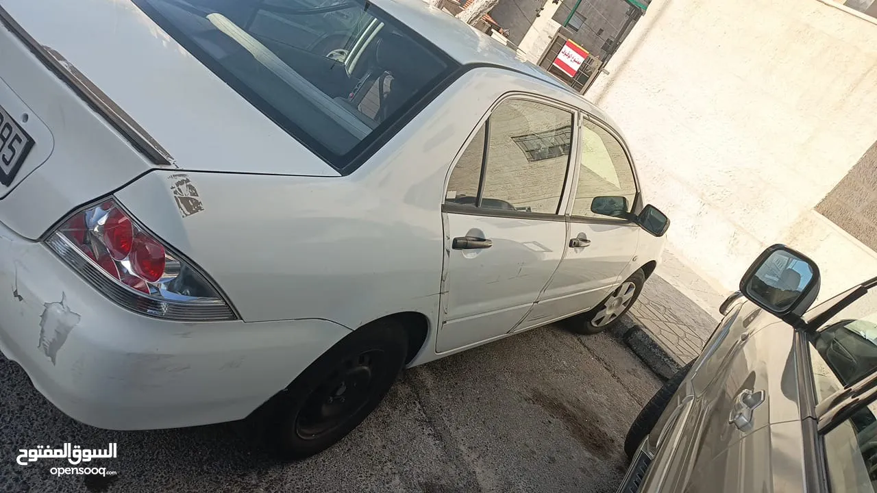 ميتسوبيشي لانسر للبيع بحاله ممتازه