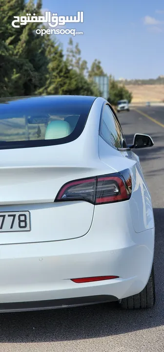 Tesla Model 3 Standerd Plus 2022 ابيض وداخليه ابيض جمرك جديد شهر 12‎ بسعر 20 الف بدون الرقم