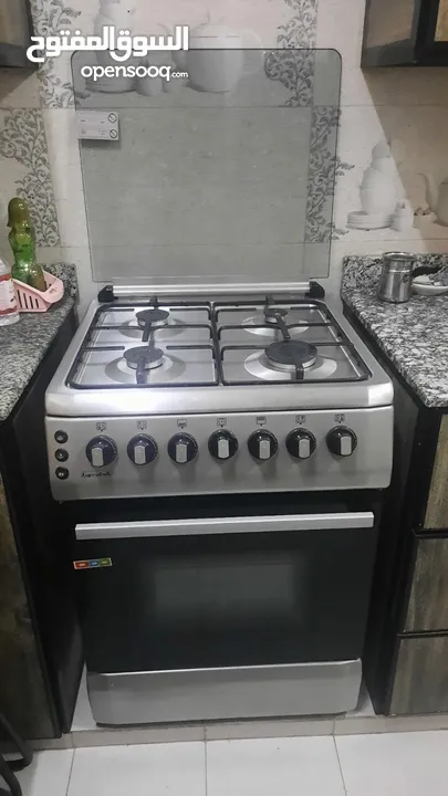 طباخة بوتاجاز 4 شعلة بفرن used like new gas stove