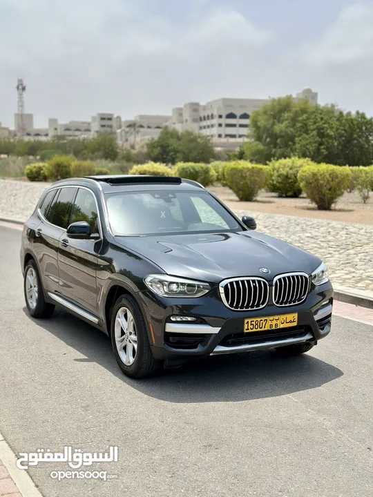 BMW X3 2021رمادي داخل احمر