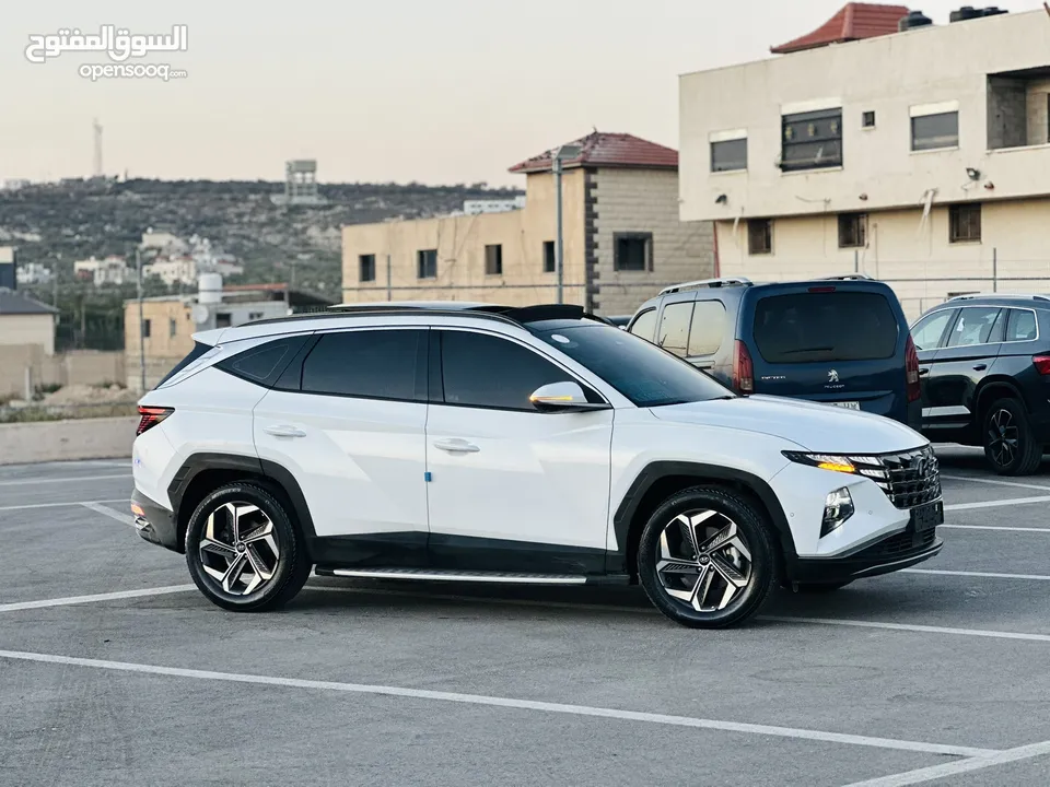 هونداي توسان/2024  فل الفل فتحة سقف بانوراما  2x4 ///240Hp بنزين + كهرباء  ( Haybrid) 1600cc