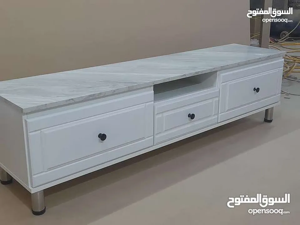 طاولات شاشه ديكورات داخلي خشب لامنيت 18م الون حسب الطلب الون حسب الطلب كفاله 5سنوات على اعمالنا