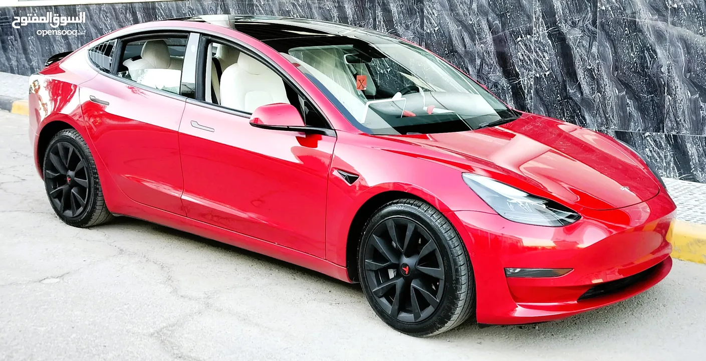 تيسلا 2022 model 3 فحص كامل 4 جــيـــد بدون ملاحظات غرفة جلد ابيض لون مميز بحالة الوكالة بسعر لقطة