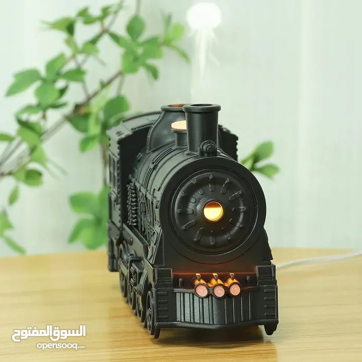 قطار البخار الصغير مش بس ملطف جو... تحفة فنية تنفث راحة وعطر! عيش تجربة بخار خرافية... جو دافئ،