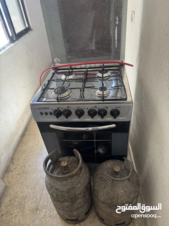 طباخ مستعمل للبيع  و 2 جرة غاز السعر 130 دينار
