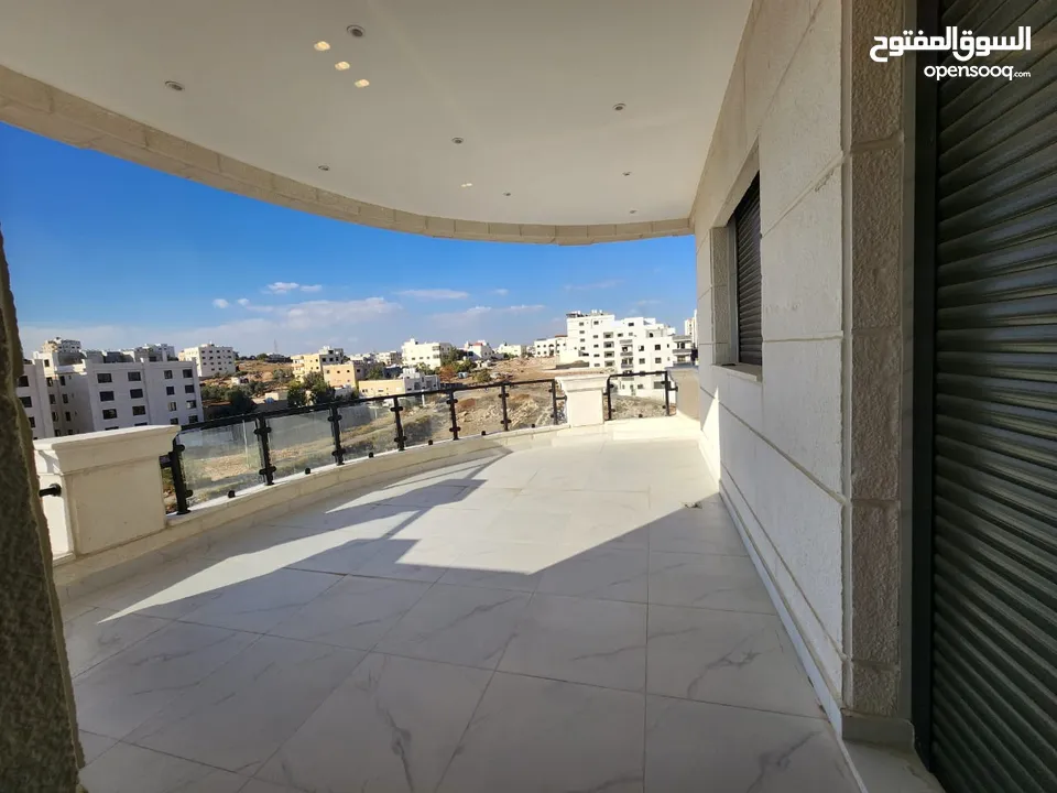 شقة مع روف دوبلكس للبيع على طريق المطار ( البنيات )  ref : 14367