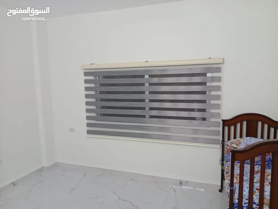 ستائر زيبرا تفصيل