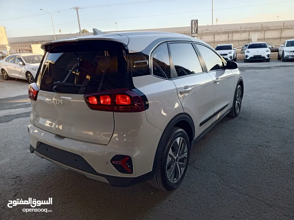 كيا نيرو touring EV (+) موديل 2023 بحالة الوكالة فل الفل دفعة اولى 500 دينار