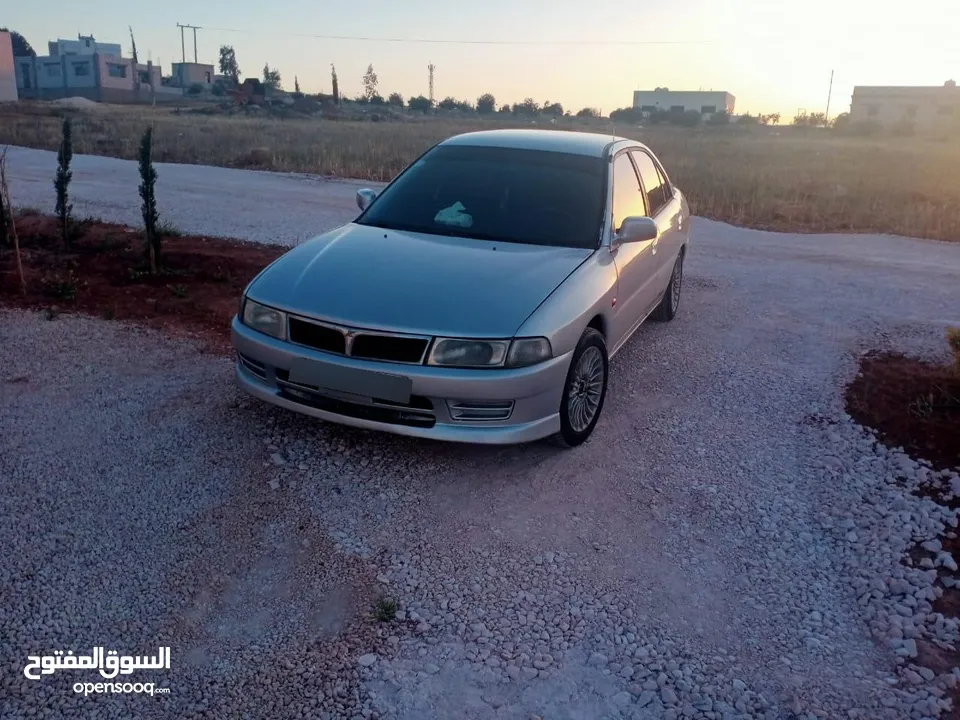 موستبيشي لانسر 99 فل نضافه للبيع