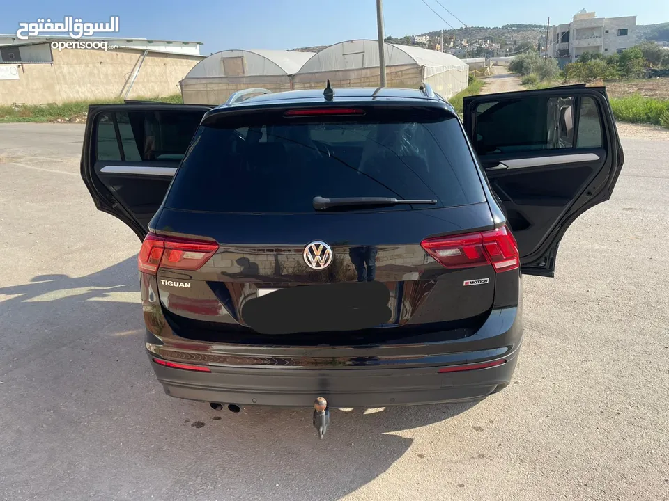 جيب تيجوان بنزين ماطور 2000 190hpصنع شهر6 2020 ولا غرام بوية ترخيص+تأمين شامل سنة كاملة لشهر 10/2026