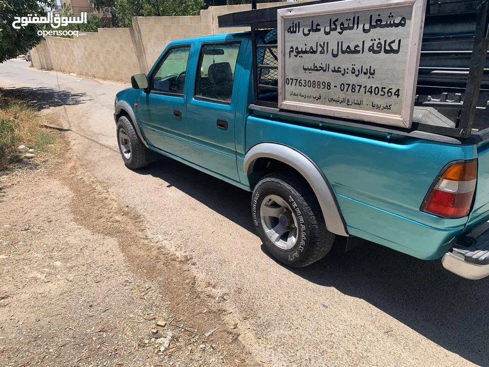 بكم اسوزو 98 دبل كمين عالي 4*4 دهان جديد ترخيص جديد تنجيد جديد كامل