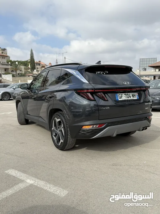هونداي توسان ترخيص 2022 محرك 1600 هايبرد plug in/يقطع على الشحنه 65 كيلو متر