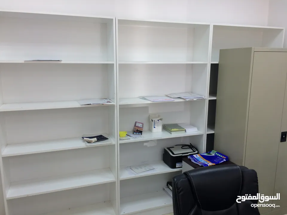 Two white shelves. Perfect for offices.