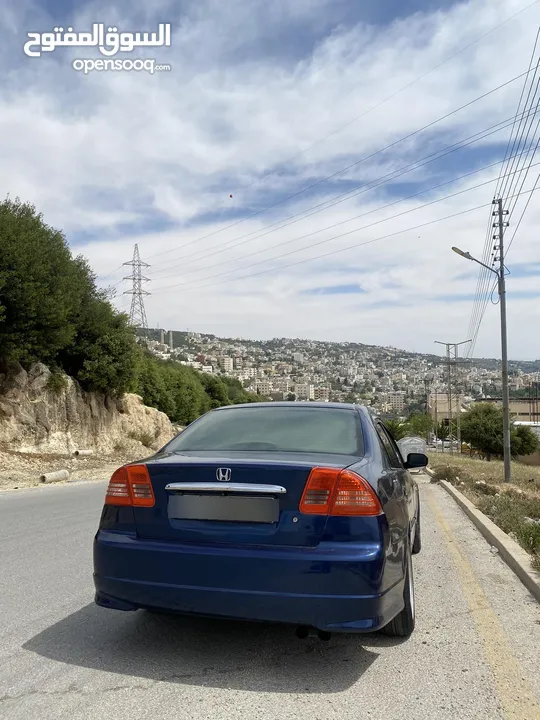 هوندا سيفيك 2001 بحاله الوكاله مرخصه جديد ولا ناقصها برغي زجاج كهرباء و عليها سستم مع شاشه و كميرا
