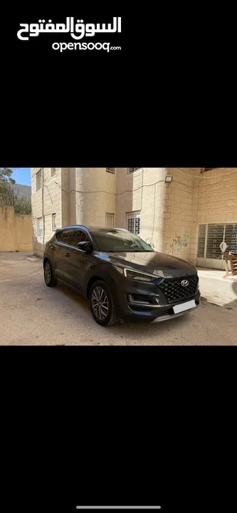 Hyundai Tucson بويه شركه فللللللل عدا فتحه  ب الورقه 5 عدسات led  بصمه  هوك