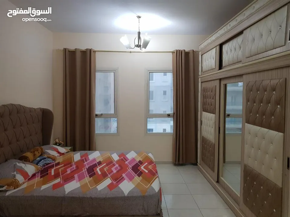ضياء)غرفة وصالة للايجار الشهري في الشارقة  بفرش فندقي اول ساكن شامل انترنت قريب ل دبي اطلالة مفتوحة