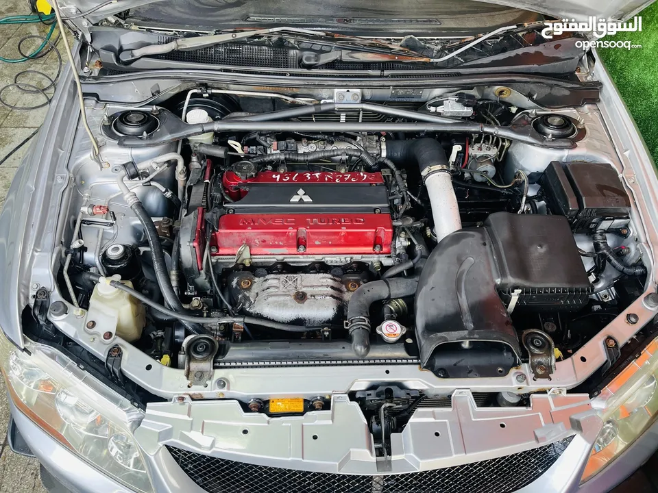 Mitsubishi Lancer Evolution 9  وارد اليابان ممشى قليل بحالة ممتازه متوفره كامله