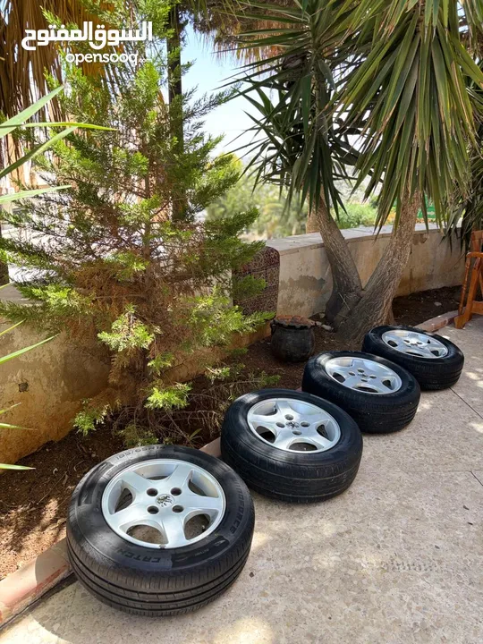 جنط بيجو 14 اصلي مع كوشوك جديد