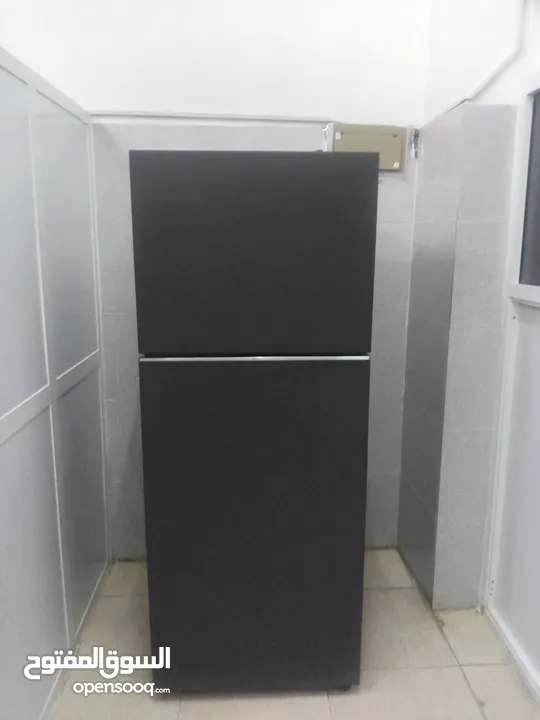 Almost new samsung large capacity refrigerator for sale